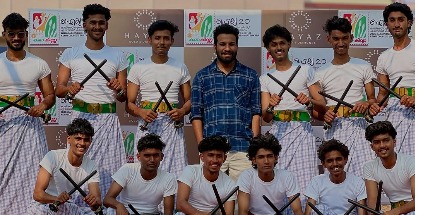 “Rhythms of Victory: Kolkali Team Clinches First Prize at A Zone Competition”